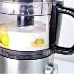 Mix eggs, dijon, milk and spices in food processor