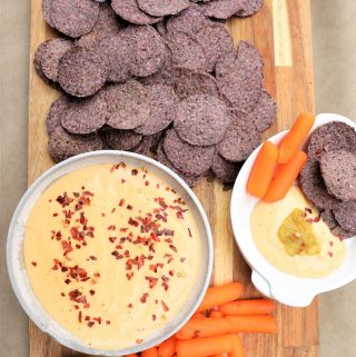 Vegan Queso Dip with chips and carrots